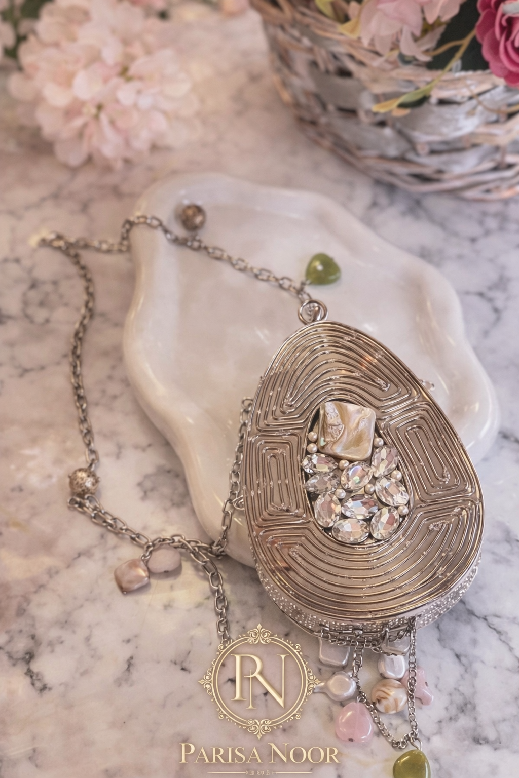 Irina Brass mini Mother of Pearl Clutch Oval Silver