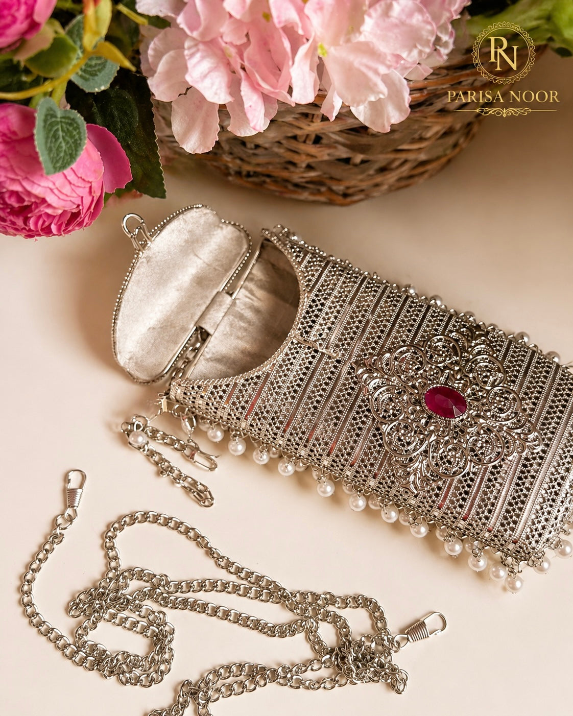 Archie Brass Mobile Silver Clutch